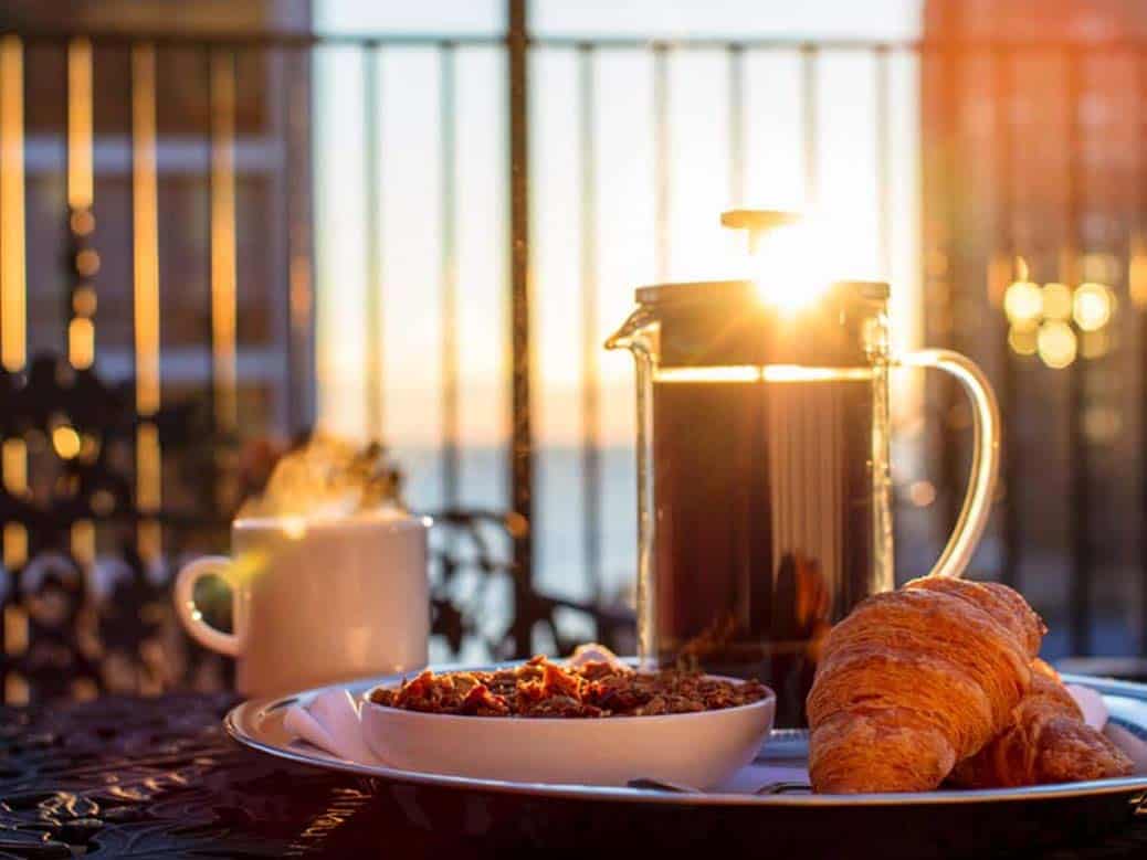 Beautifully shot sunset hotel photo detail of a meal in Ambassador Chicago Hotel