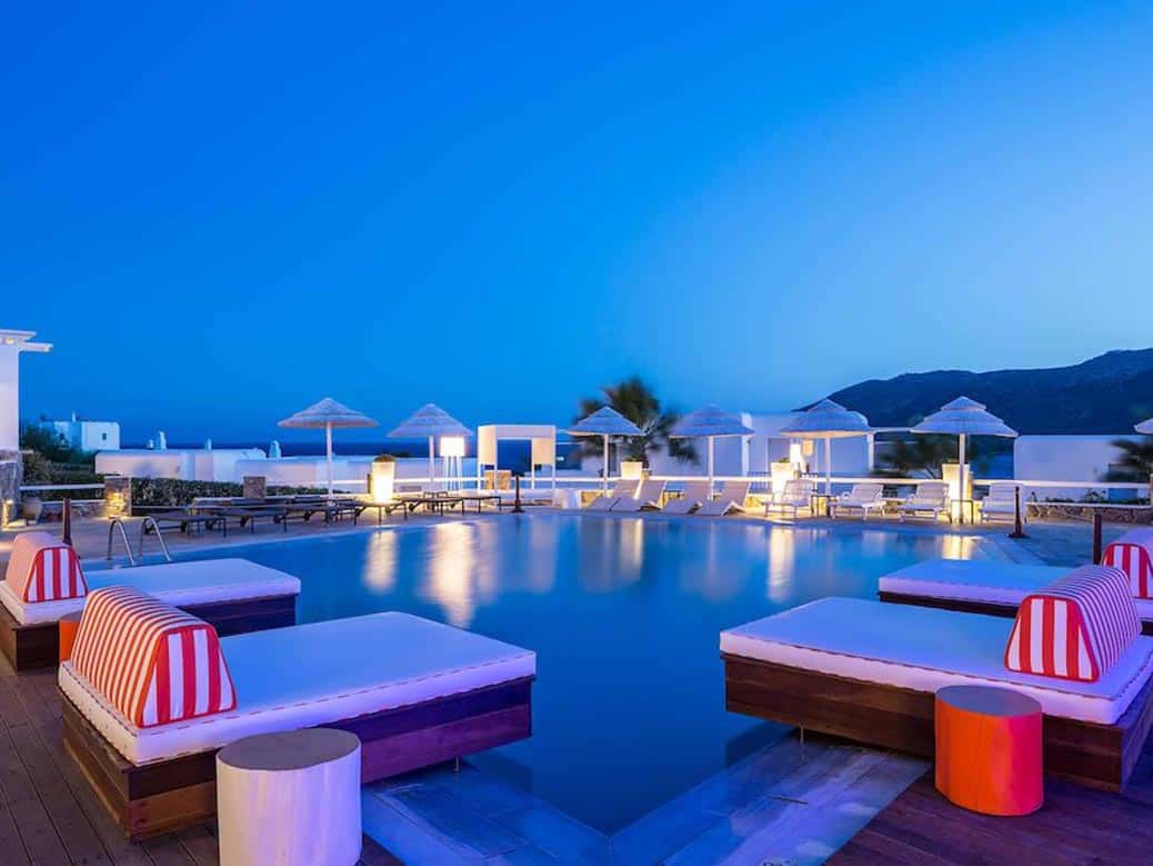 Romantic sunset hotel photo of swimming pool of Archipelagos Hotel Mykonos Greece